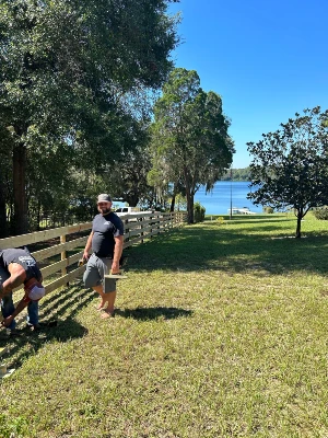 four board fencing with lake